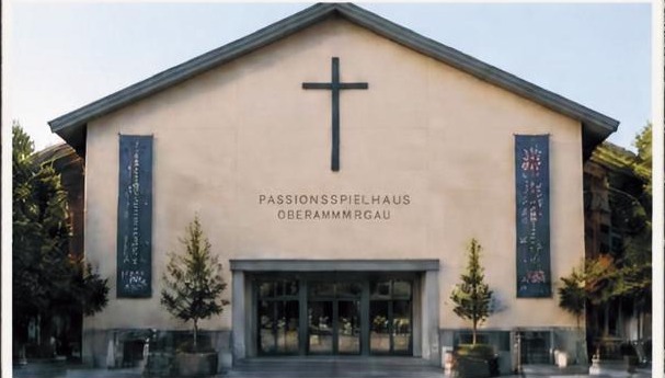 The Passion Play theatre in Oberammergau with a cross on its façade